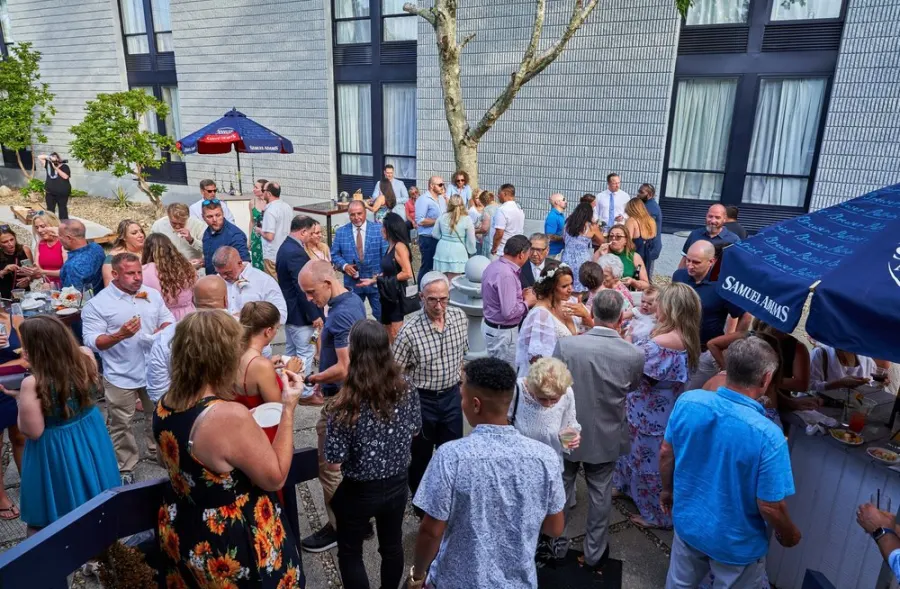 Guests gathering in the outdoor courtyard