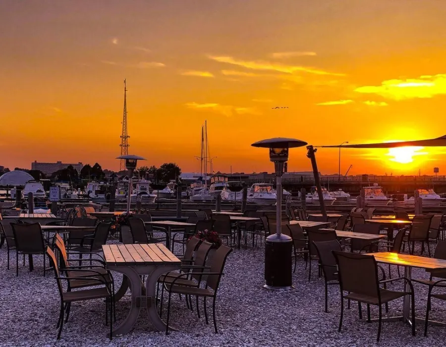 Sunset over the marina from the waterfront seating area